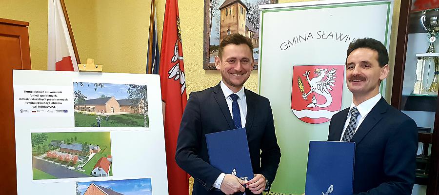 Dalsza rewitalizacja przestrzeni publicznych w gminie Sławno dotyczy obszaru wsi Bobrowice, gdzie powstanie przedszkole nawiązujące swą architekturą do typowej zabudowy wiejskiej Dalsza rewitalizacja przestrzeni publicznych w gminie Sławno dotyczy obszaru wsi Bobrowice, gdzie powstanie przedszkole nawiązujące swą architekturą do typowej zabudowy wiejskiej.